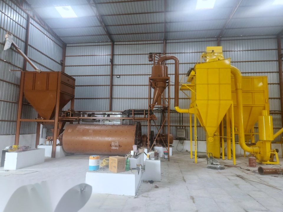 14 ft by 6 ft air-swept ball mill installed with feed hopper, cyclone and reverse-pulse-jet bag filter