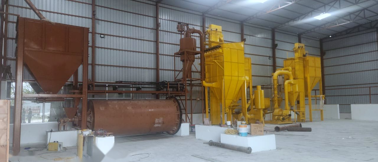 Micronizer plant assembled in the fabrication hall, viewed along the line
