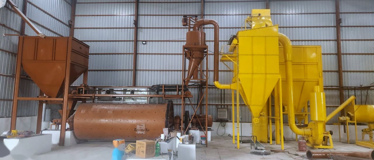 Complete micronizer plant line installed in the works: brown ball mill, cyclone and yellow bag filters